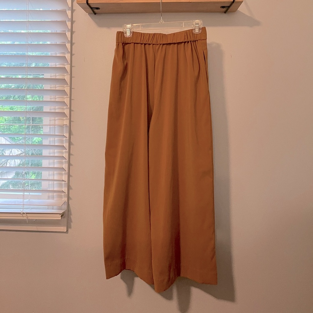 Mustard yellow wide leg gaucho pants from Zara